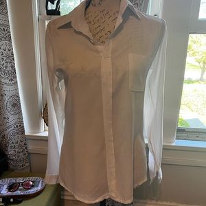 Women’s small white blouse.